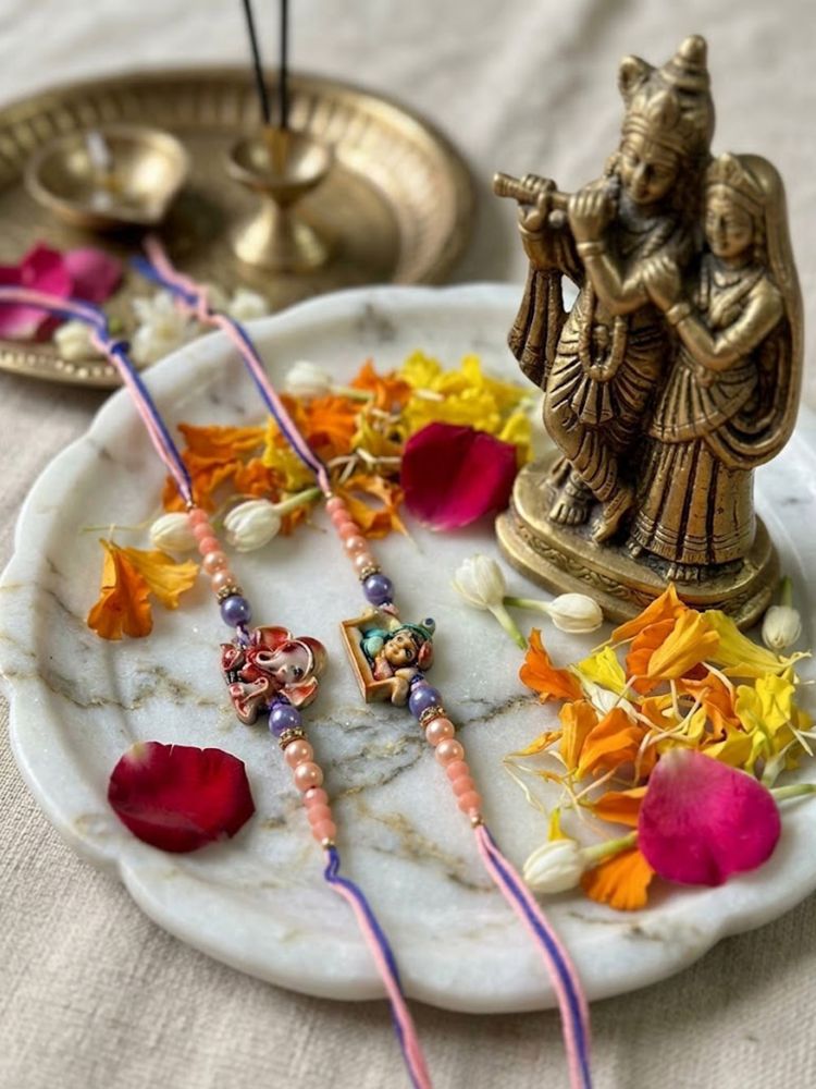 NVR Set of 2 Krishna Ji & Ganesh Ji Beaded Religious Thread Rakhi with Roli Chawal | Grocsy