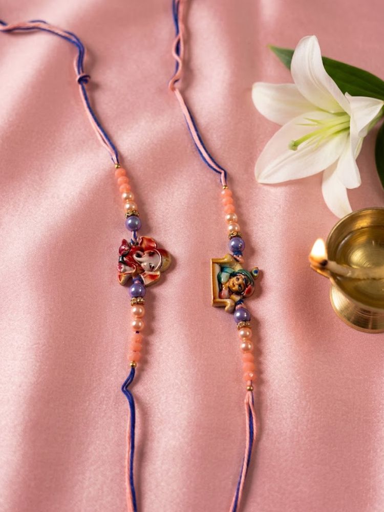 NVR Set of 2 Krishna Ji & Ganesh Ji Beaded Religious Thread Rakhi with Roli Chawal | Grocsy