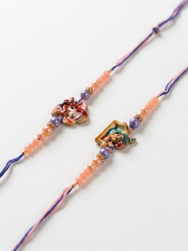 NVR Set of 2 Krishna Ji & Ganesh Ji Beaded Religious Thread Rakhi with Roli Chawal | Grocsy