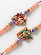 NVR Set of 2 Krishna Ji & Ganesh Ji Beaded Religious Thread Rakhi with Roli Chawal | Grocsy