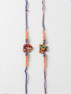 NVR Set of 2 Krishna Ji & Ganesh Ji Beaded Religious Thread Rakhi with Roli Chawal | Grocsy