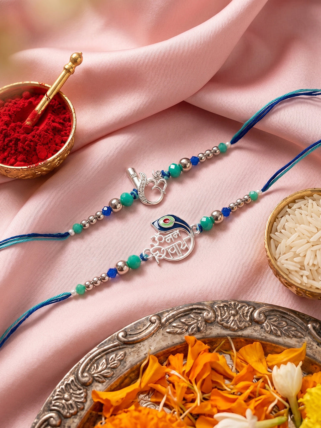 NVR Set of 2 Silver Toned Beaded Religious Thread Rakhi with Roli Chawal Chandan Mishri | Grocsy