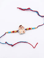 NVR Kids Shinchan Character Artificial Beads Thread Rakhi with Roli Chawal Chandan Mishri | Grocsy