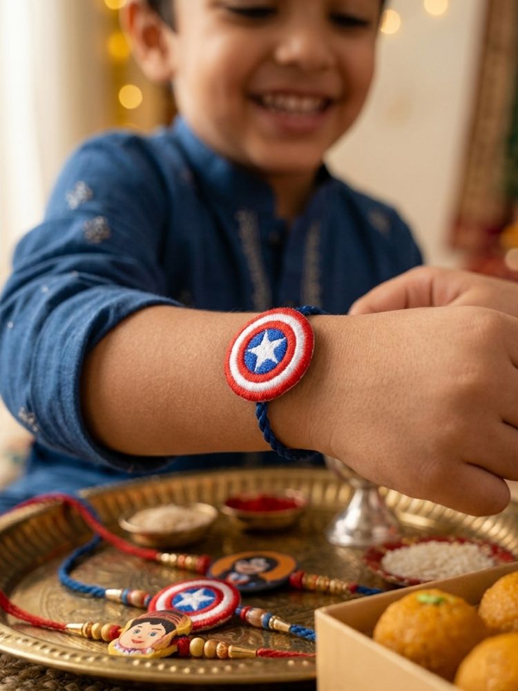 NVR Stylish Red & Blue Avengers Design Kids Rakhi with Roli Chawal Chandan Mishri | Grocsy