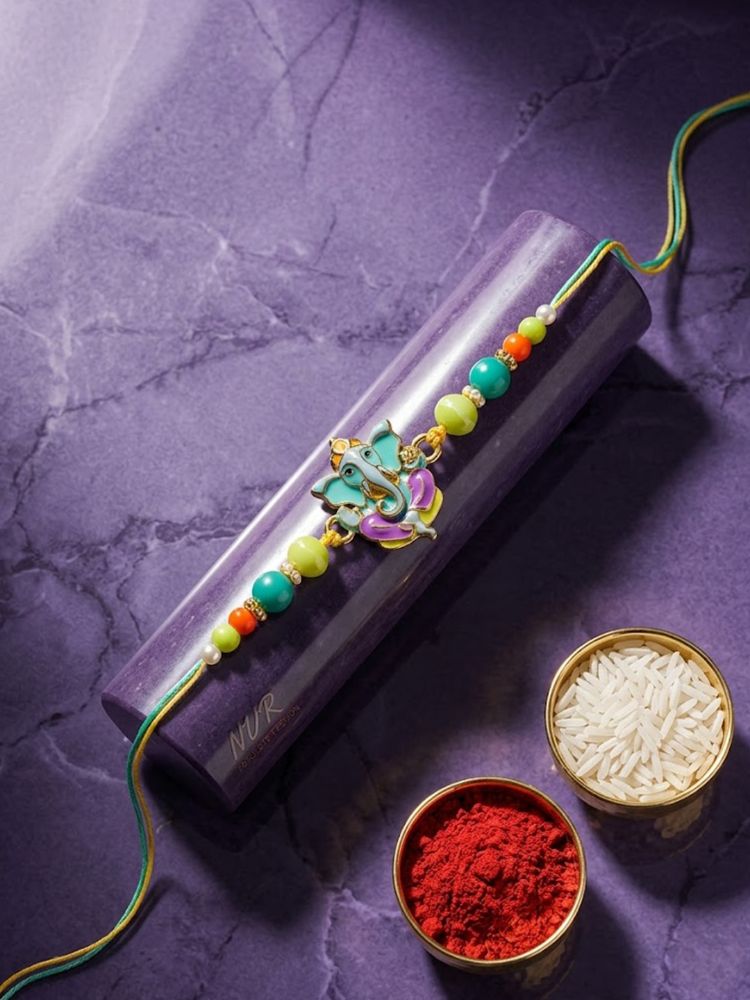 NVR Multicolor Artificial Beads Ganesh Ji Thread Rakhi With Roli Chawal Chandan Mishri | Grocsy