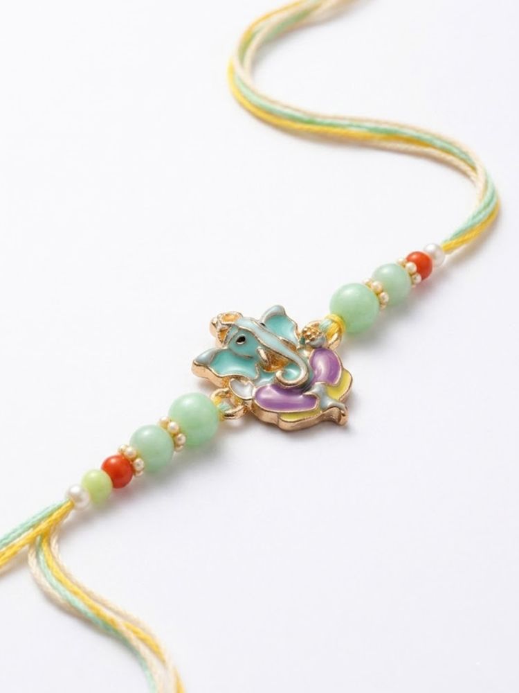 NVR Multicolor Artificial Beads Ganesh Ji Thread Rakhi With Roli Chawal Chandan Mishri | Grocsy