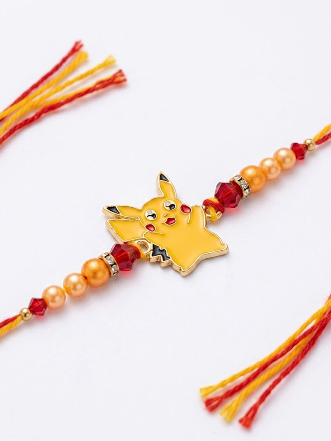 NVR Kids Pikachu Pokemon Cartoon Yellow & Red Thread Rakhi with Roli Chawal Chandan Mishri | Grocsy