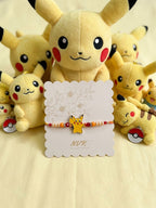 NVR Kids Pikachu Pokemon Cartoon Yellow & Red Thread Rakhi with Roli Chawal Chandan Mishri | Grocsy