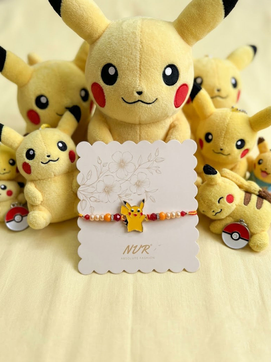 NVR Kids Pikachu Pokemon Cartoon Yellow & Red Thread Rakhi with Roli Chawal Chandan Mishri | Grocsy