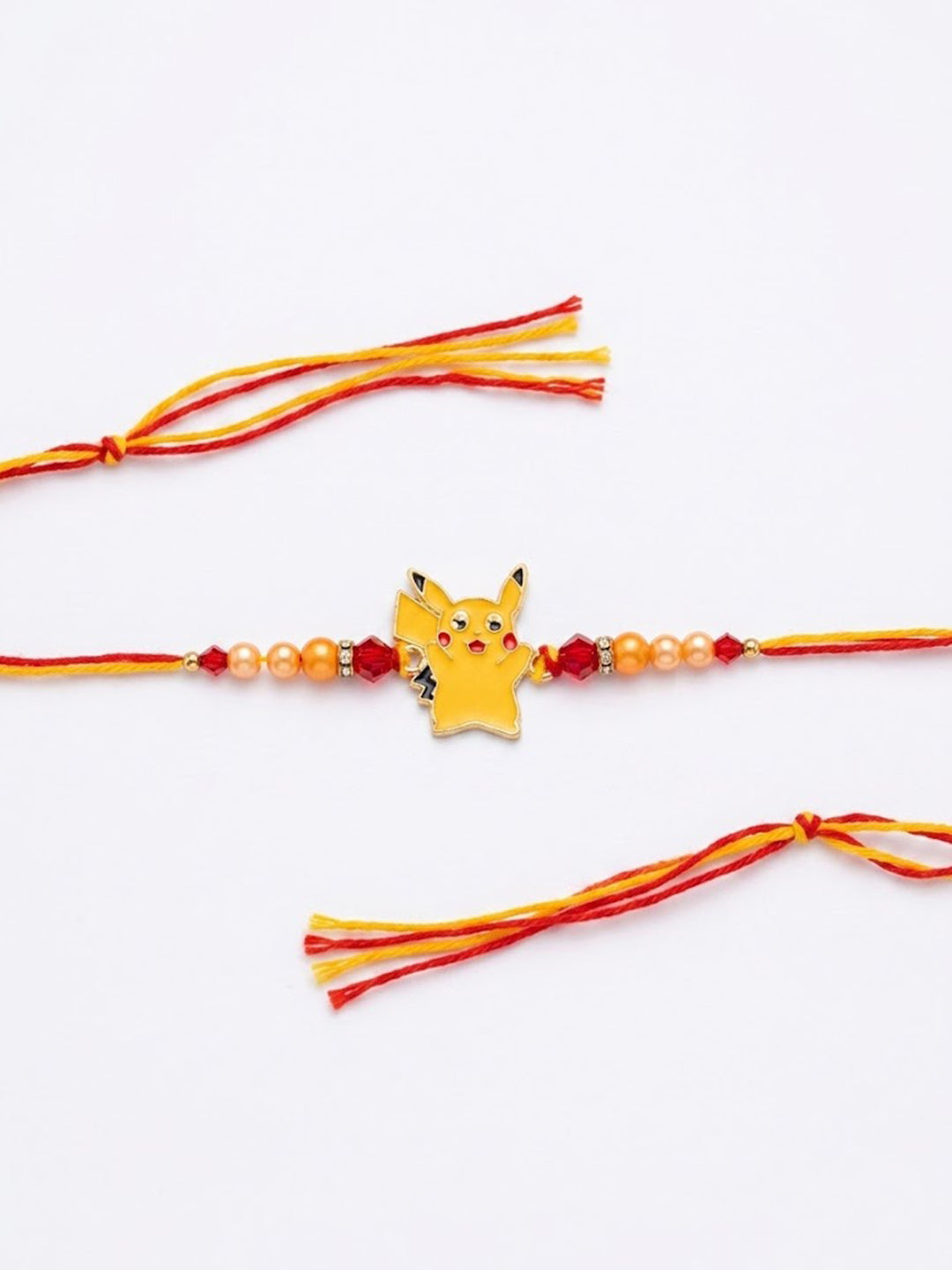 NVR Kids Pikachu Pokemon Cartoon Yellow & Red Thread Rakhi with Roli Chawal Chandan Mishri | Grocsy