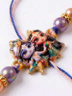 NVR Radha Krishna Multicolor Artificial Beads Thread Rakhi With Roli Chawal Chandan Mishri | Grocsy