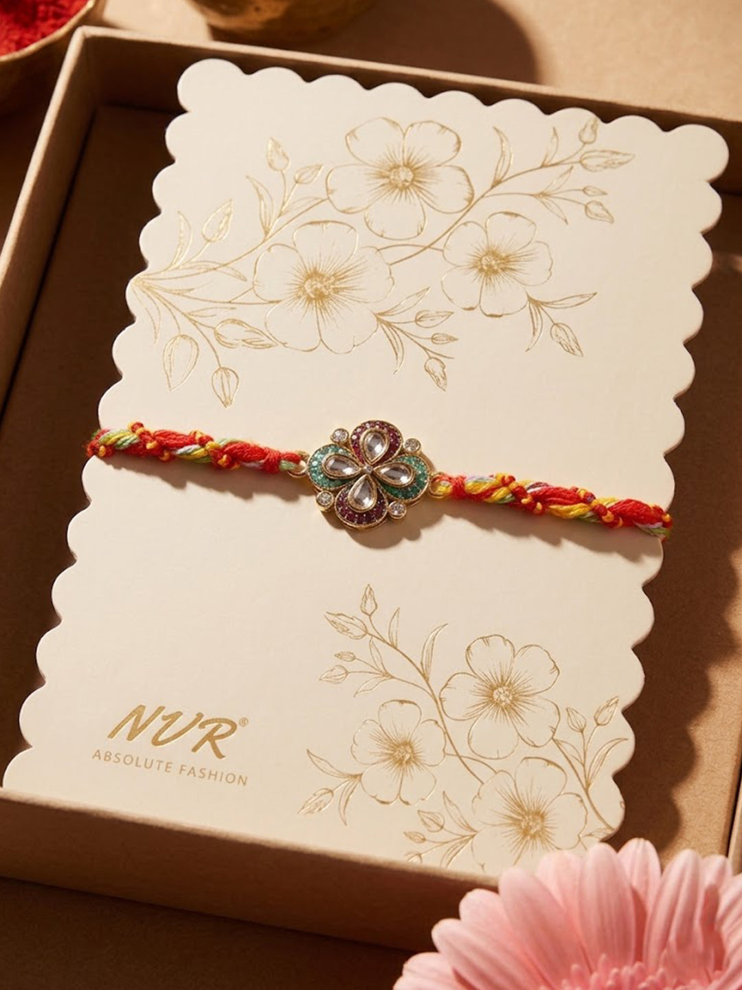 NVR Traditional Artificial Stones Thread Rakhi with Roli Chawal Chandan Mishri | Grocsy