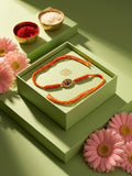 NVR Om Motif Divine Religious Thread Rakhi with Roli Chawal Chandan Mishri | Grocsy