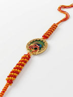 NVR Om Motif Divine Religious Thread Rakhi with Roli Chawal Chandan Mishri | Grocsy