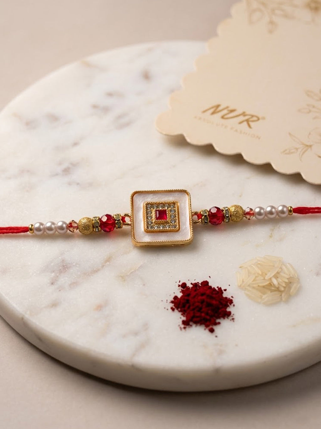 NVR Square Design Multicolor Artificial Stones & Pearls Thread Rakhi With Roli Chawal | Grocsy