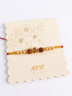 NVR Om Design Rudraksh Thread Rakhi with Roli Chawal Chandan Mishri | Grocsy