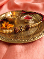 NVR Om Design Rudraksh Thread Rakhi with Roli Chawal Chandan Mishri | Grocsy