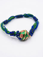NVR Magnetic Opening Blue Meenakari Work Thread Rakhi with Roli Chawal Chandan Mishri | Grocsy
