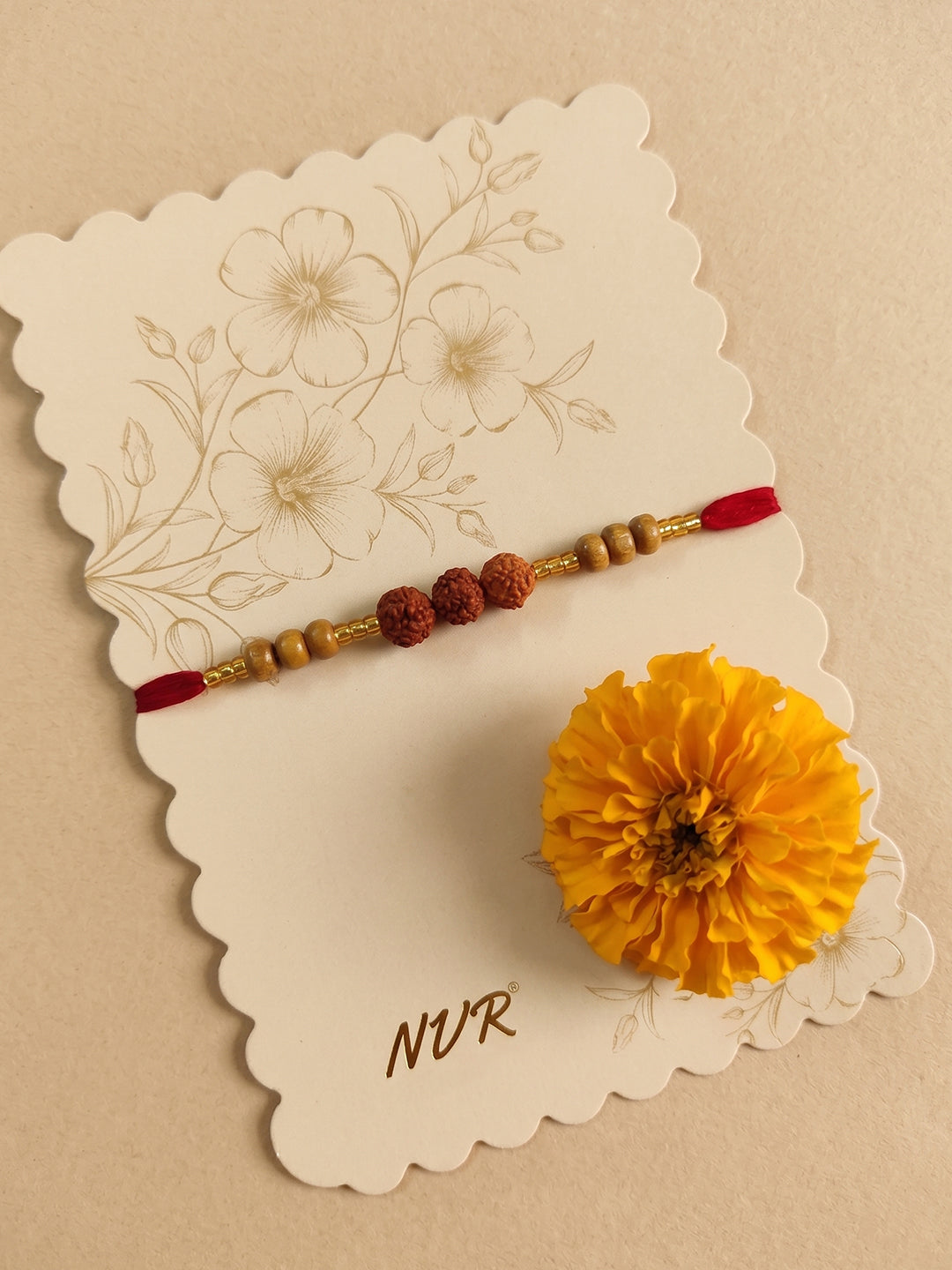 NVR Religious Rudraksh & Red Thread Rakhi with Roli Chawal Chandan Mishri | Grocsy