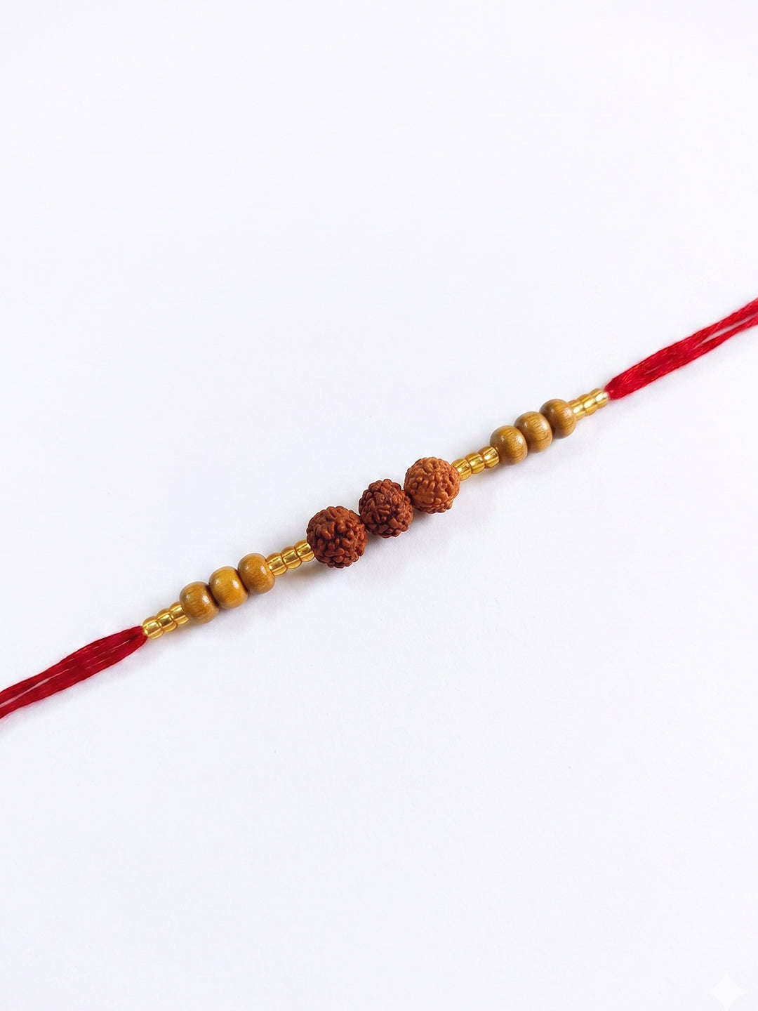 NVR Religious Rudraksh & Red Thread Rakhi with Roli Chawal Chandan Mishri | Grocsy