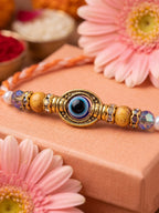 NVR Set of 4 Multicolor Evil Eye Thread Rakhi with Roli Chawal Chandan Mishri | Grocsy