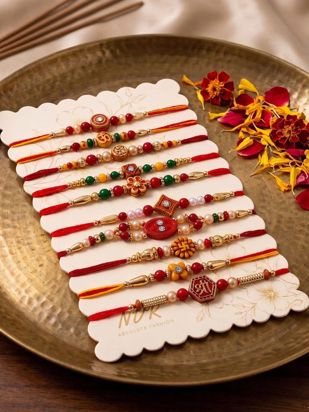 NVR Set of 10 Artificial Stones & Beads Thread Rakhi with Roli Chawal Chandan Mishri | Grocsy