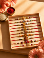 NVR Set of 10 Artificial Stones & Beads Thread Rakhi with Roli Chawal Chandan Mishri | Grocsy