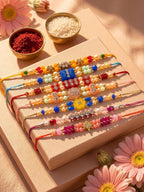 NVR Set of 7 Multicolor Designer Thread Rakhi with Roli Chawal Chandan Mishri | Grocsy