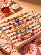 NVR Set of 7 Multicolor Designer Thread Rakhi with Roli Chawal Chandan Mishri | Grocsy