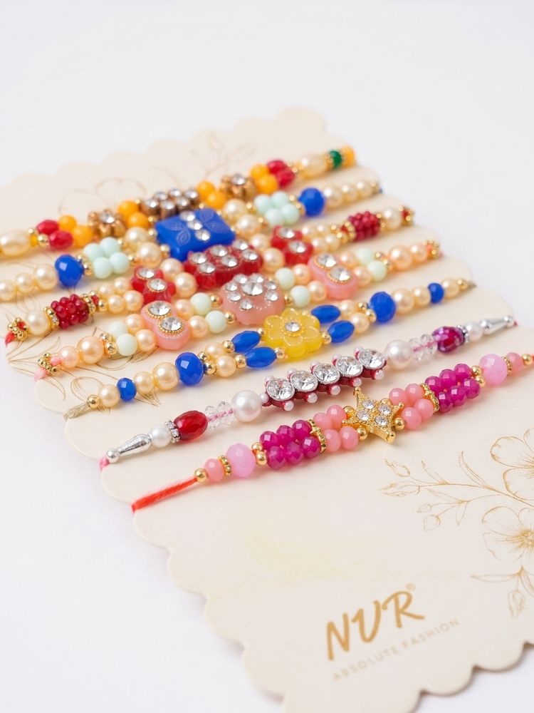 NVR Set of 7 Multicolor Designer Thread Rakhi with Roli Chawal Chandan Mishri | Grocsy