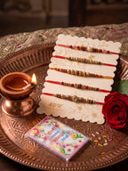NVR Set of 5 Multicolor Designer Thread Rakhi with Roli Chawal Chandan Mishri | Grocsy