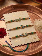 NVR Set of 3 Peacock Design Multicolor Artificial Beads Thread Rakhi With Roli Chawal | Grocsy