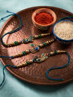 NVR Set of 3 Peacock Design Multicolor Artificial Beads Thread Rakhi With Roli Chawal | Grocsy