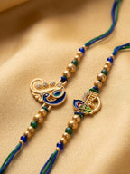 NVR Set of 2 Krishna & Peacock Design Artificial Beads Thread Rakhi With Roli Chawal | Grocsy
