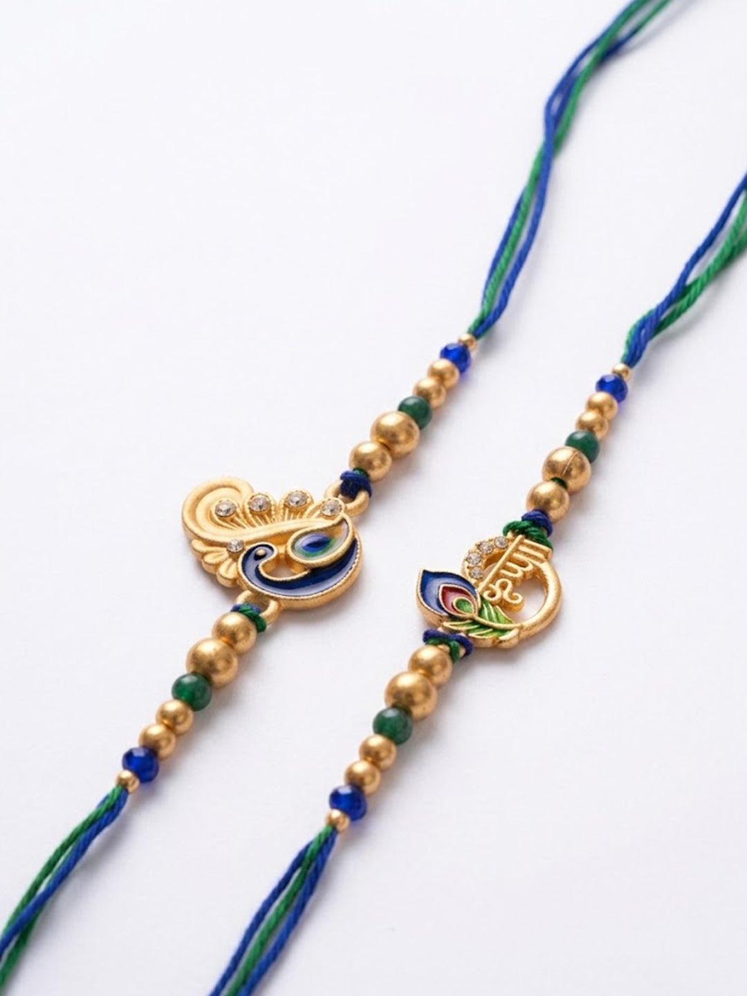 NVR Set of 2 Krishna & Peacock Design Artificial Beads Thread Rakhi With Roli Chawal | Grocsy