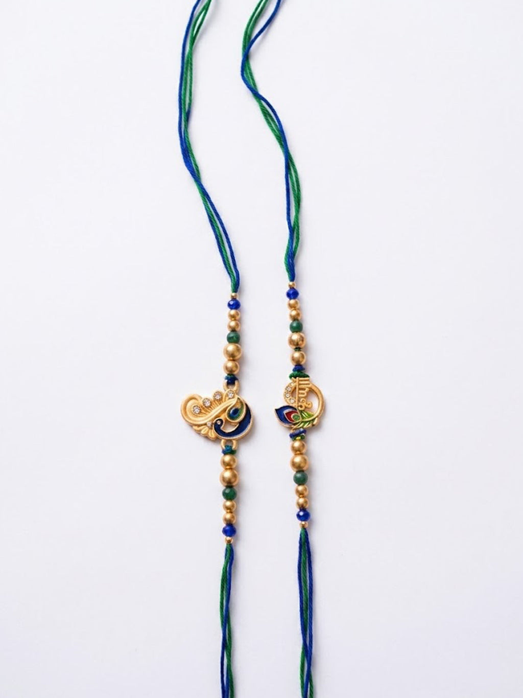 NVR Set of 2 Krishna & Peacock Design Artificial Beads Thread Rakhi With Roli Chawal | Grocsy