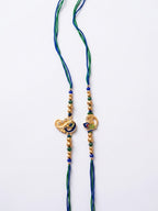 NVR Set of 2 Krishna & Peacock Design Artificial Beads Thread Rakhi With Roli Chawal | Grocsy