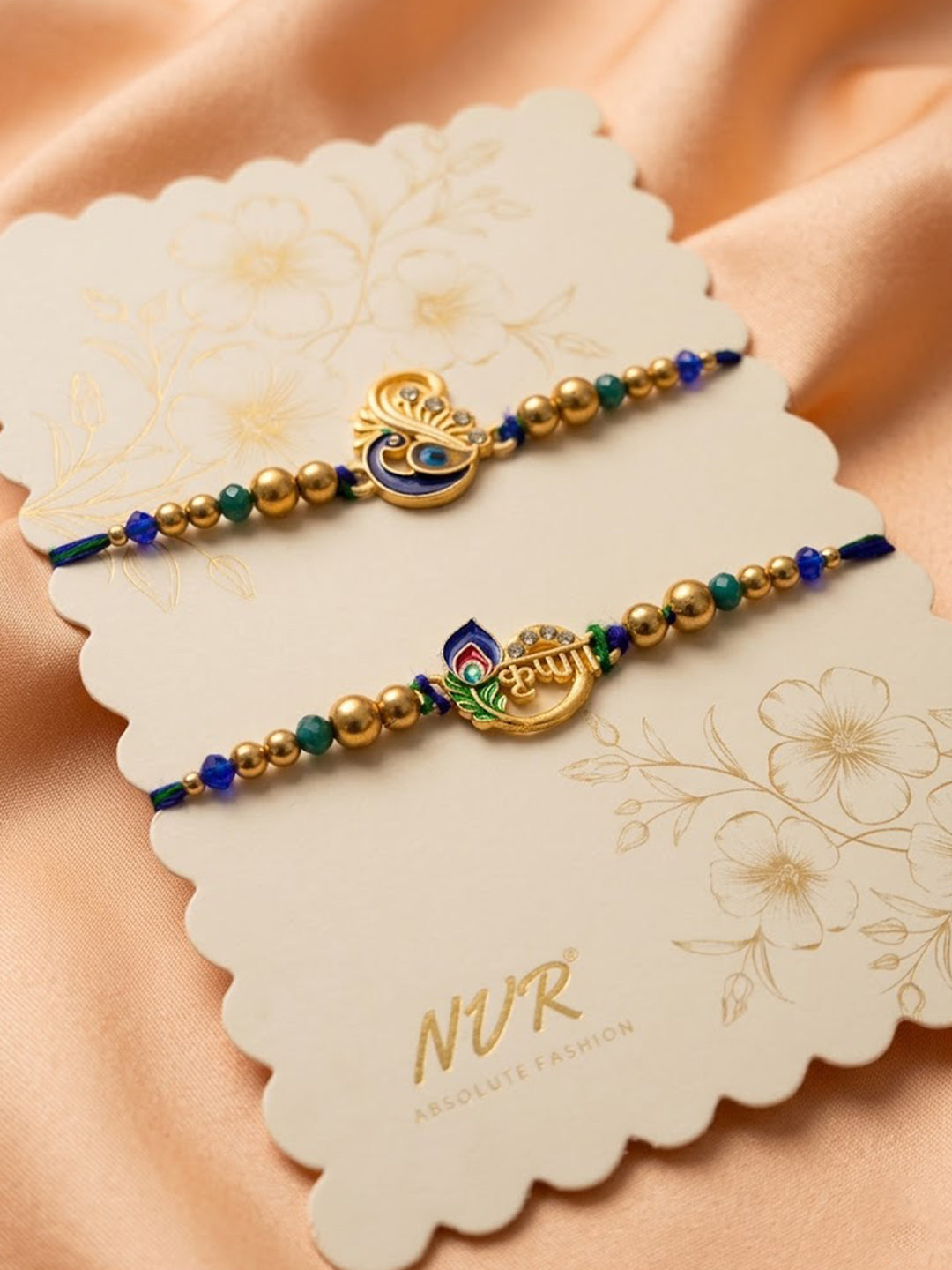 NVR Set of 2 Krishna & Peacock Design Artificial Beads Thread Rakhi With Roli Chawal | Grocsy