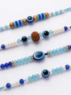 NVR Set of 4 Blue Evil Eye Thread Rakhi with Roli Chawal Chandan Mishri | Grocsy
