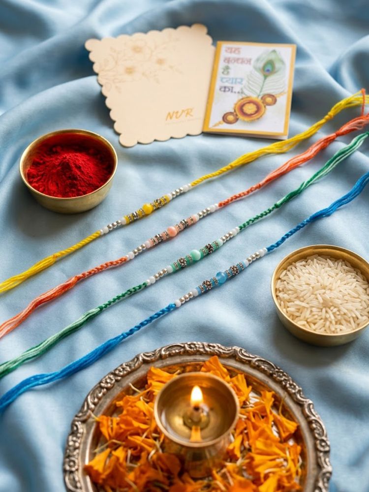 NVR Set of 4 Multicolor Artificial Beads Thread Rakhi with Roli Chawal Chandan Mishri | Grocsy