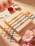NVR Set of 4 Multicolor Artificial Beads Thread Rakhi with Roli Chawal Chandan Mishri | Grocsy