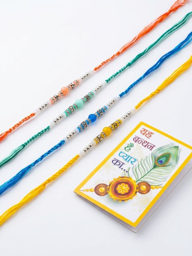 NVR Set of 4 Multicolor Artificial Beads Thread Rakhi with Roli Chawal Chandan Mishri | Grocsy