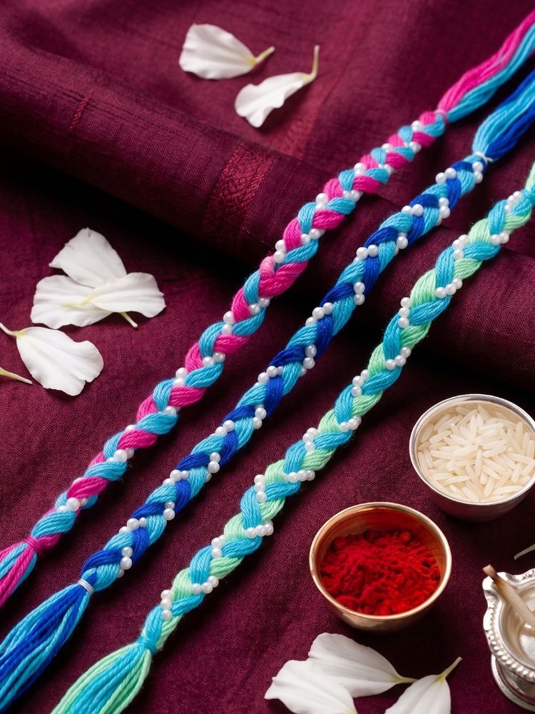 NVR Set of 3 Multicolor Thread Rakhi with Roli Chawal Chandan Mishri | Grocsy