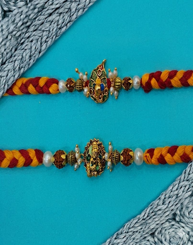 NVR Set of 2 Pearls Religious Thread Rakhi with Roli Chawal Chandan Mishri | Grocsy