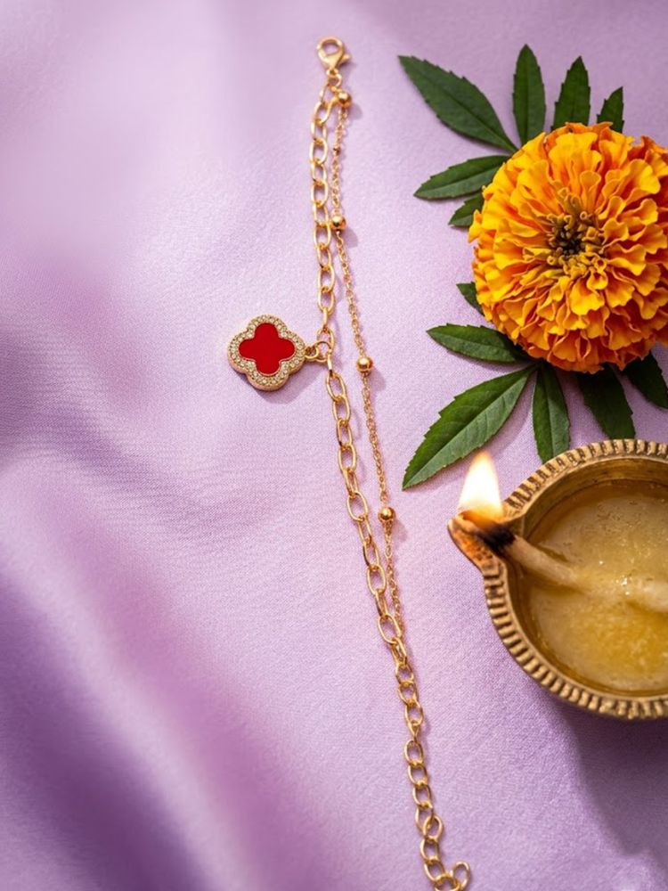 NVR Women Artrificial Stones Gold Plated Rakhi with Roli Chawal Chandan Mishri | Grocsy