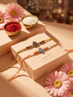 NVR Set of 2 Multicolor Religious Thread Rakhi with Roli Chawal Chandan Mishri | Grocsy