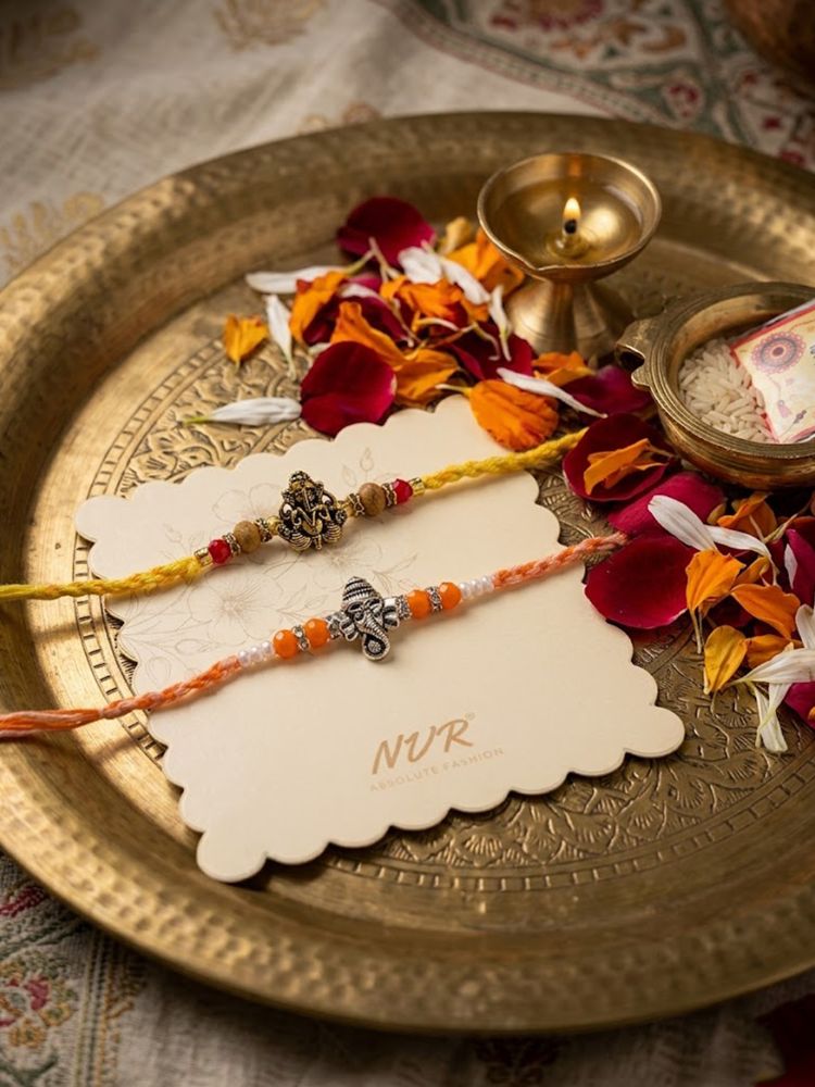NVR Set of 2 Multicolor Religious Thread Rakhi with Roli Chawal Chandan Mishri | Grocsy