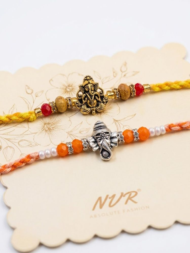 NVR Set of 2 Multicolor Religious Thread Rakhi with Roli Chawal Chandan Mishri | Grocsy