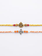 NVR Set of 2 Multicolor Religious Thread Rakhi with Roli Chawal Chandan Mishri | Grocsy