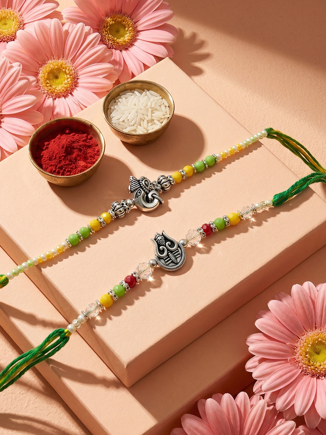 NVR Set of 2 Multicolor Religious Thread Rakhi with Roli Chawal Chandan Mishri | Grocsy